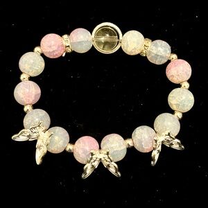 Pink and white beaded bracelet with silver butterfly charms 
16.5cm/6.5in